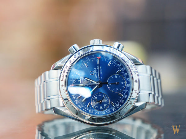 Omega Speedmaster triple date blue dial The Watch Collector