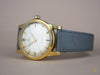 Omega 2577, 18K solid gold, unpolished condition with original unrestored two-tone dial.