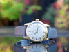 Omega 2577, 18K solid gold, unpolished condition with original unrestored two-tone dial