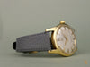 Omega 2577, 18K solid gold, unpolished condition with original unrestored two-tone dial