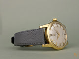 Omega 2577, 18K solid gold, unpolished condition with original unrestored two-tone dial