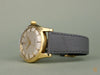 Omega 2577, 18K solid gold, unpolished condition with original unrestored two-tone dial