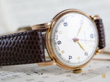 Helvetia Solid gold vintage dress watch