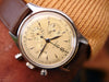 Omega chronograph Ref 2451 with extract from the archives
